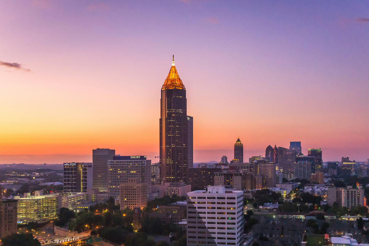 A city skyline at sunset. Atlantic City CFO is available here and everywhere else with internet.