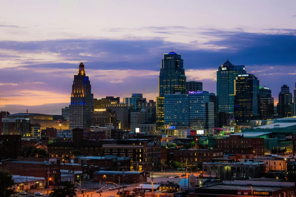 A city skyline at night where you can find CPA services in Kansas City.